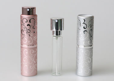 ガラス小さい詰め替え式のねじれは噴霧器の香水スプレーを吹きかけるためにカスタマイズされるピンク色をびん詰めにし、