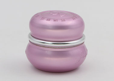 化粧品のピンクによって浮彫りにされるロゴのためのふたが付いている詰め替え式の小さい容器
